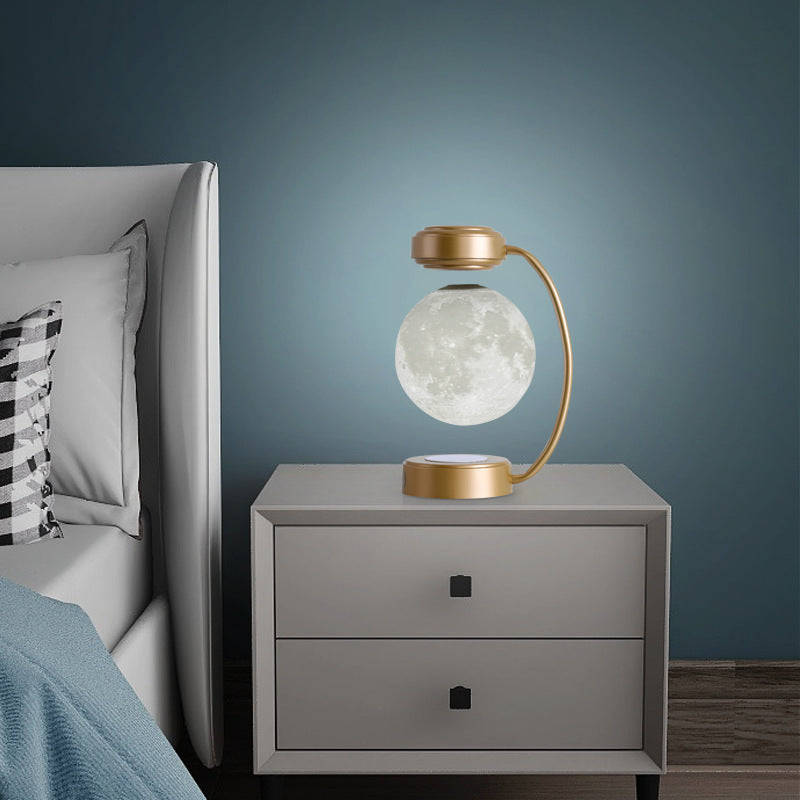 "AstraMoon™ 3D Magnetic Wireless Rotating Lamp – Dreamy Decor for Home, Office & Bookshops"