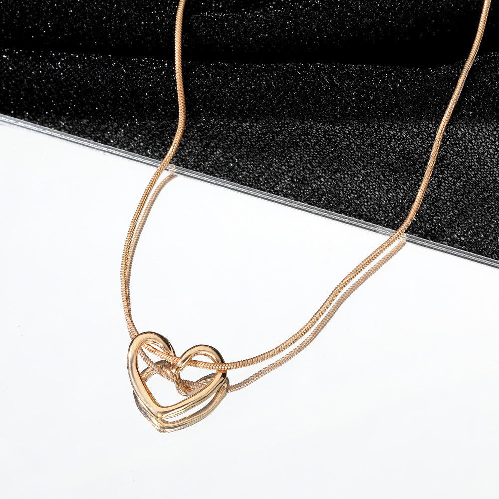 "Hollow Heart Necklace for Women – Romantic Gold Pendant Jewelry, Ideal Gift for Her"